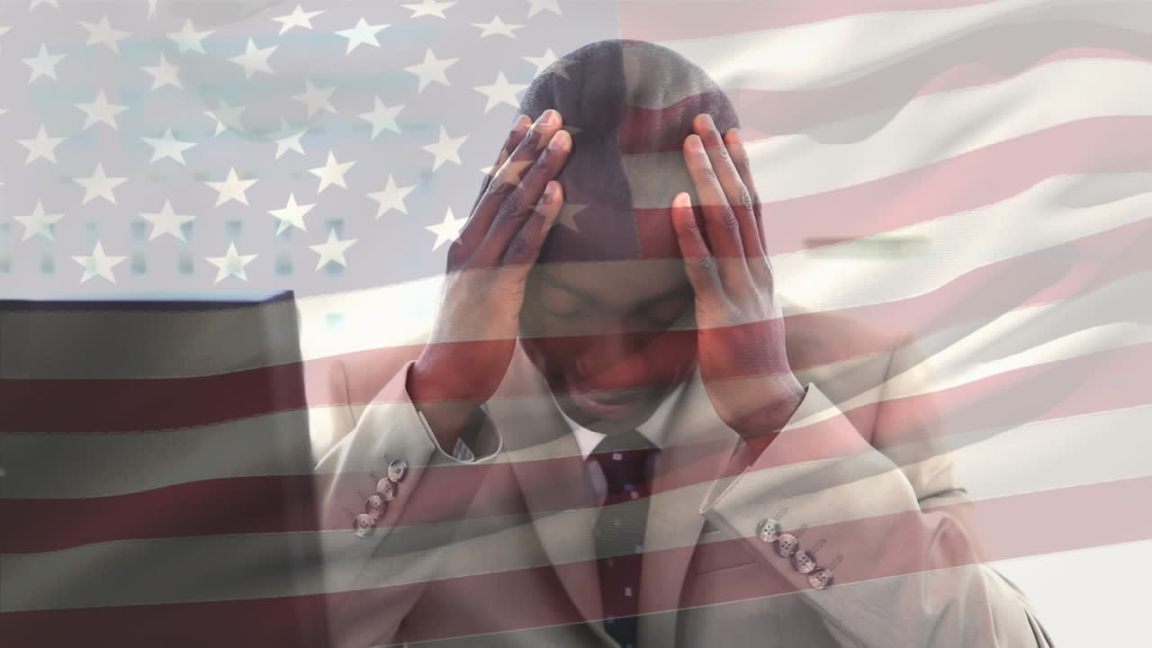 Animation of african american businessman scratching head over flag of usa