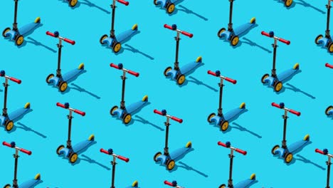 flat lay composition with set of kick scooters on  blue background.