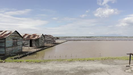 drone flight between the old wooden houses in salinas, bani