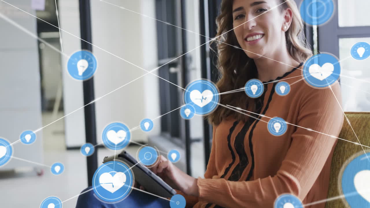 animación de una red de conexiones con iconos sobre una mujer de negocios caucásica que usa una tableta