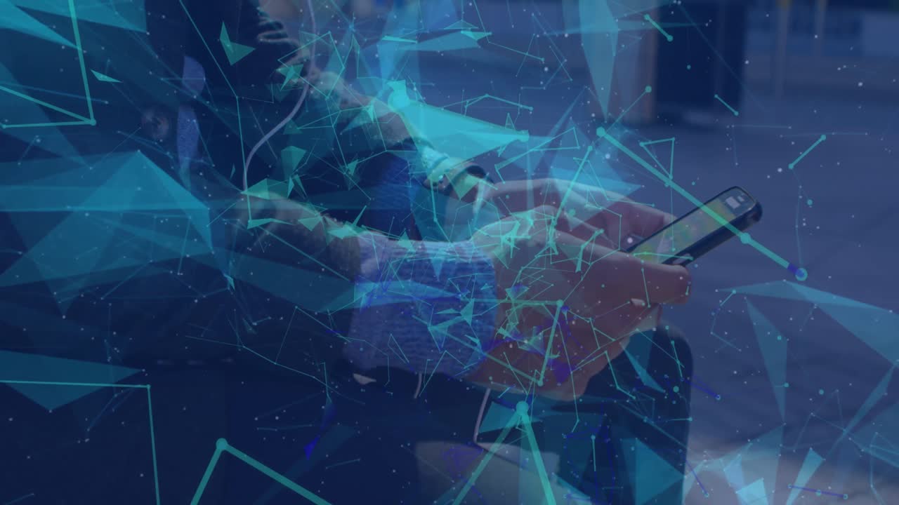 Network of connections floating against mid section of businessman using smartphone at office