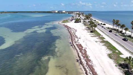 dunedin, causeway boulevard leading to honeymoon island state park on any given sunny weekend