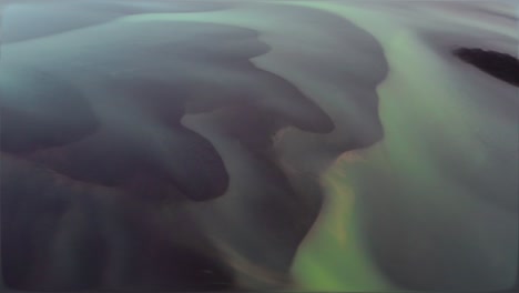 Abstract Aerial View Of Blue Olfusa River During Sunny day in Iceland