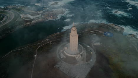 aerial view of coastal lighthouse on top of hill, roman tower of hercules in coruña, galicia spain
