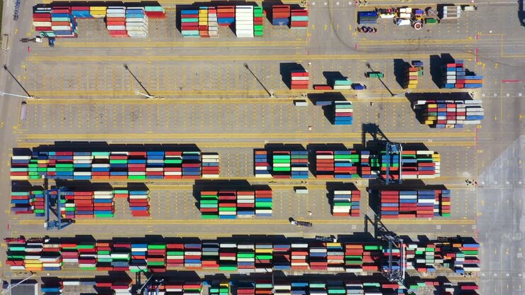 Container ship in import export and business logistic, By crane, Trade Port, Shipping cargo to harbor, International transportation, Business logistics concept, Aerial view