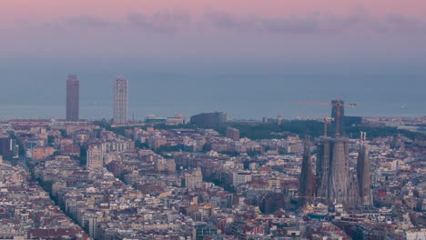 timelapse of barcelona at sunset seen from the turó de la rovira or bunkers del carmel