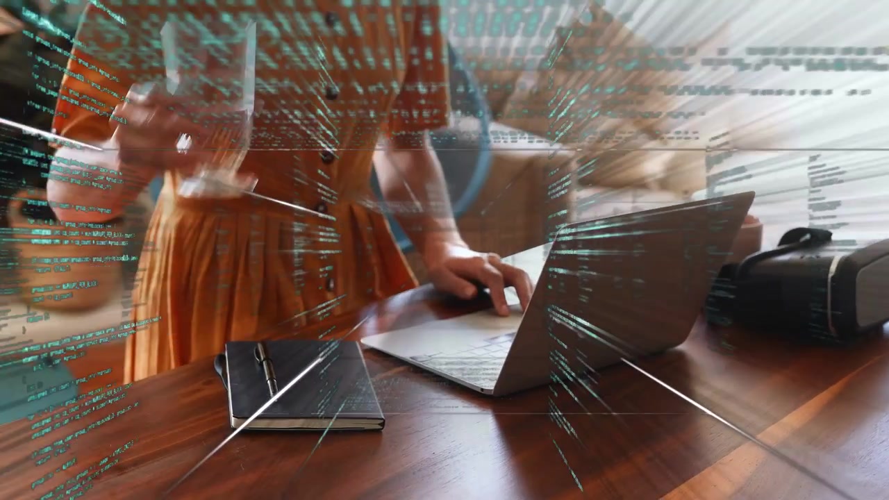 Woman placing hands on laptop, typing and reaching glass, code overlay intensifying for remote work