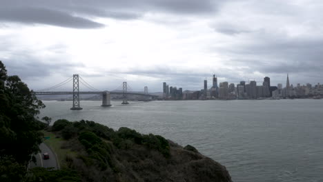 san francisco bay bridge and city skyline on a cloudy day