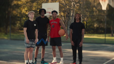 group of young men playing basketball