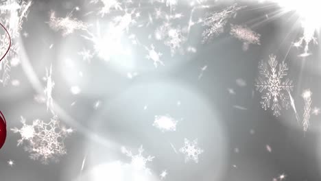 animation of snow falling over light spots on grey background