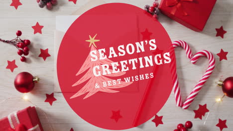 animation of seasons greetings text over christmas decorations