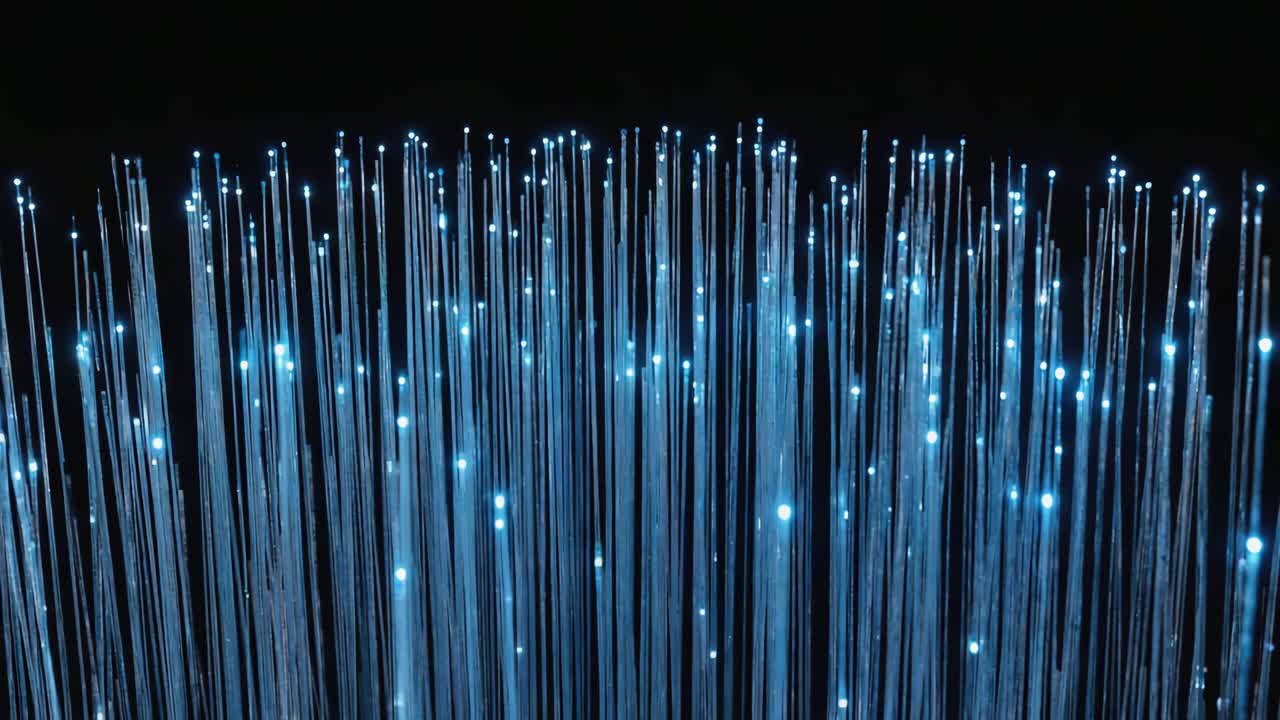 Glowing Blue Fiber Optic Cables on Black Background