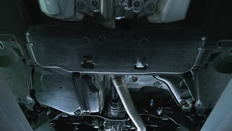 undercarriage view of a car with exhaust system