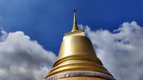 buddhist temple pagoda golden color plated chedi wat khao hua chuk thailand