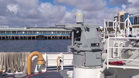 Deadly-cannon-on-front-of-US-Coast-Guard-vessel,-motion-view