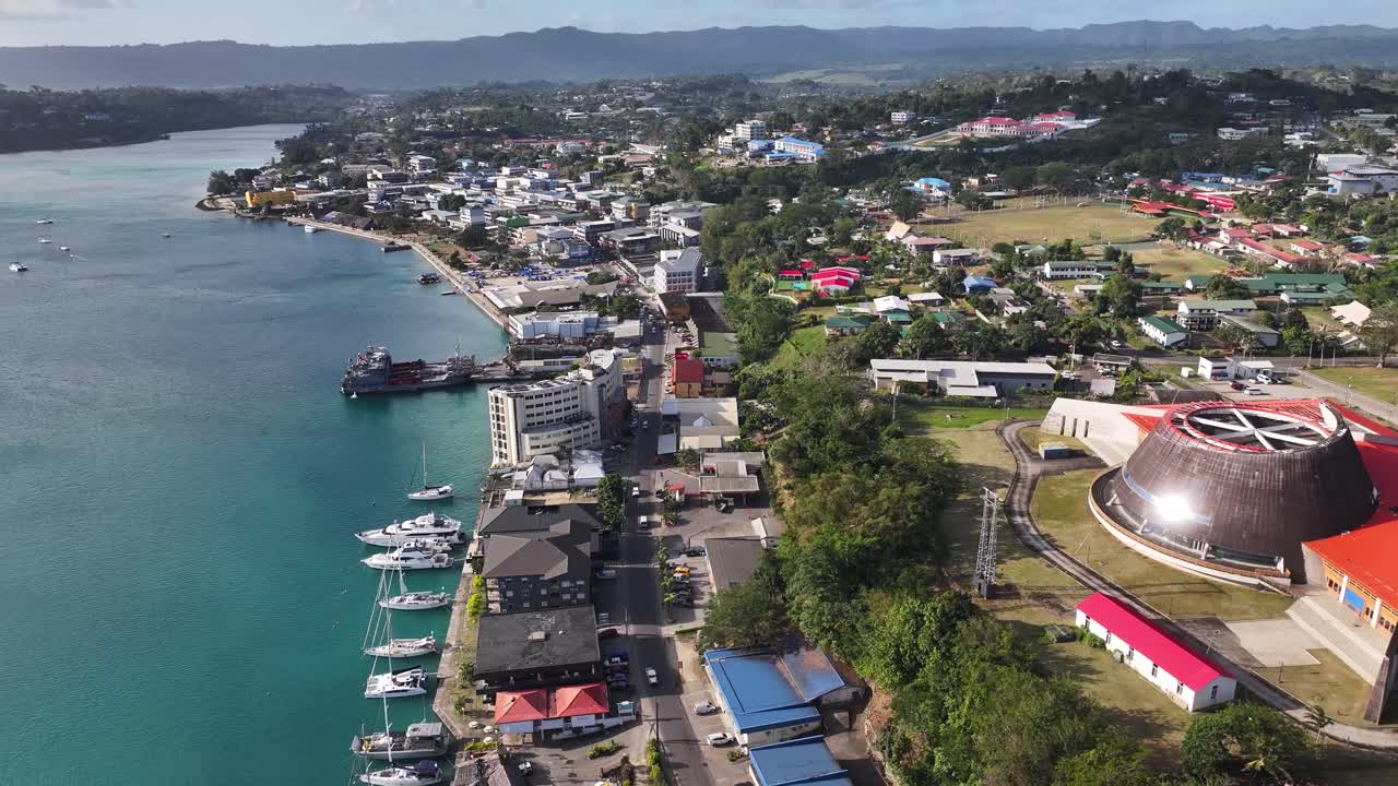 Coastal Town With The National Convention Centre In Port Vila, The Island Of Vanuatu. Aerial Drone Shot