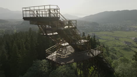 revolve around abandoned ski jump overlooking tranquil ski resort of bakuriani in georgia