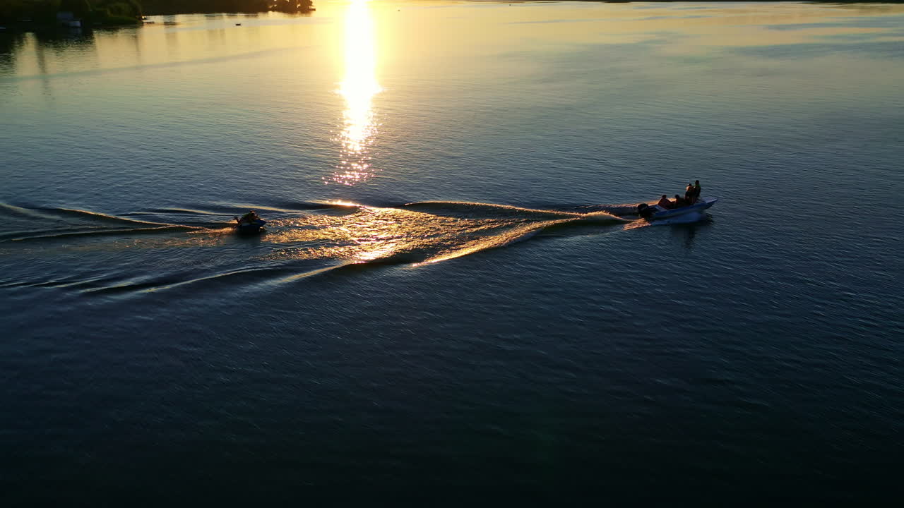 Rest on river by boat. Aerial view of motor boat floats on the river