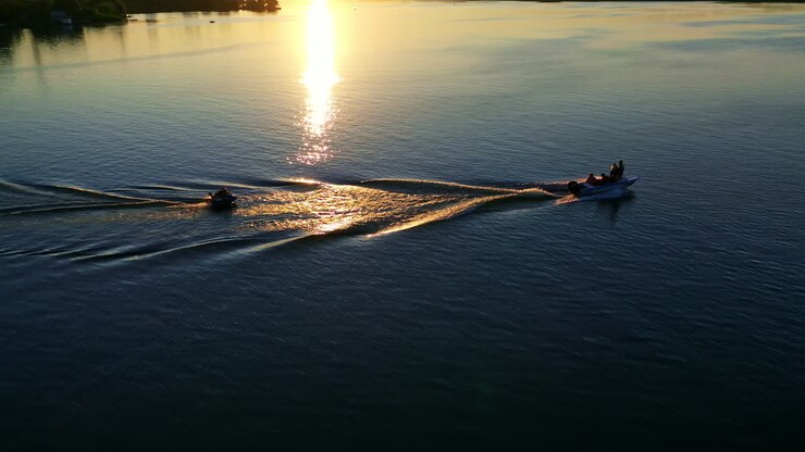 Rest on river by boat. Aerial view of motor boat floats on the river