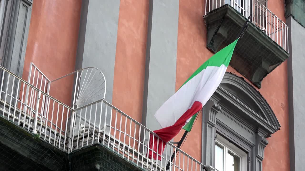 4K. Italian flag waving in wind, located in Piazza del Plebiscito, Naples