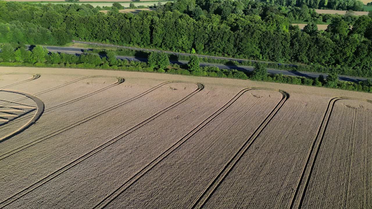 Strange Micheldever Station geometric wheat field crop circle aerial view dolly left reveal