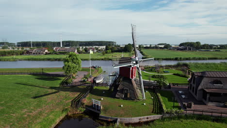 Aerial-View-Of-Doesmolen-Seesaw-Mill-and-Old-Miller's-House-near-Hoogmade,-Netherlands