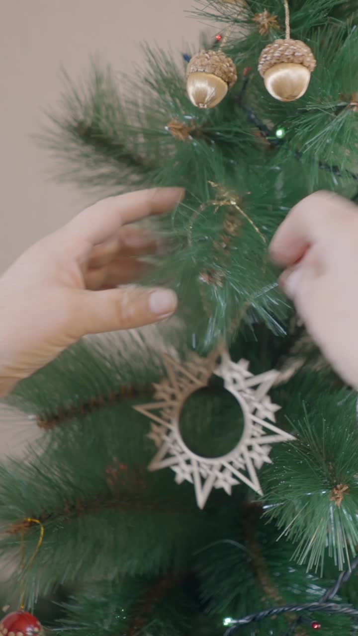 Decorating a Christmas Tree with an Intricate Star Ornament