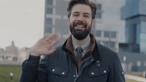 Man Waving in City