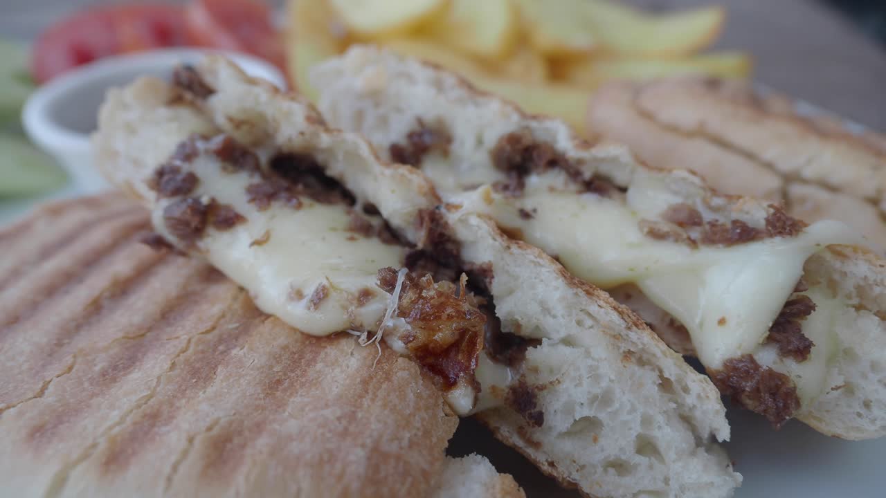 Sandwich with Melted Cheese and French Fries