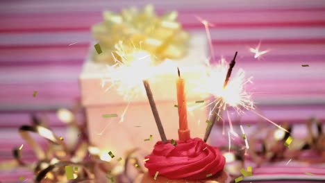 pastel con velas y chispas rodeado de animación de confeti, celebrando el cumpleaños