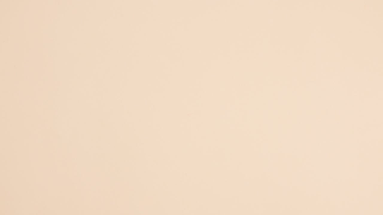 Hardcover vintage retro books ordering and open on beige background with copy space. Stop motion flat lay