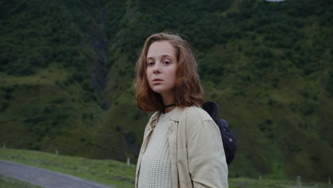 young woman in mountains