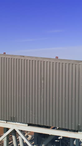 granary grain elevators. metal tanks for the storage crop. large bins for farming. vertical video