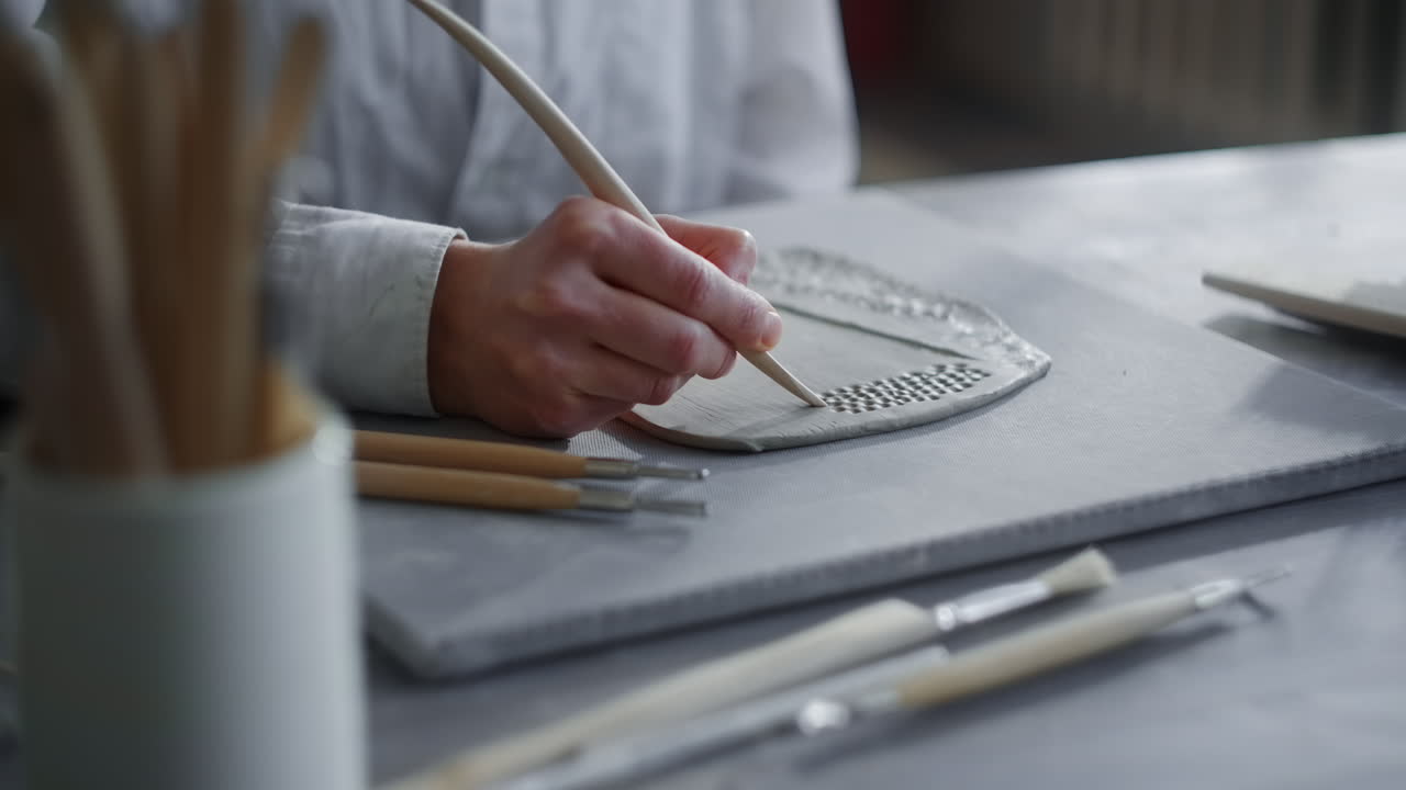 Woman Creating Pottery Piece