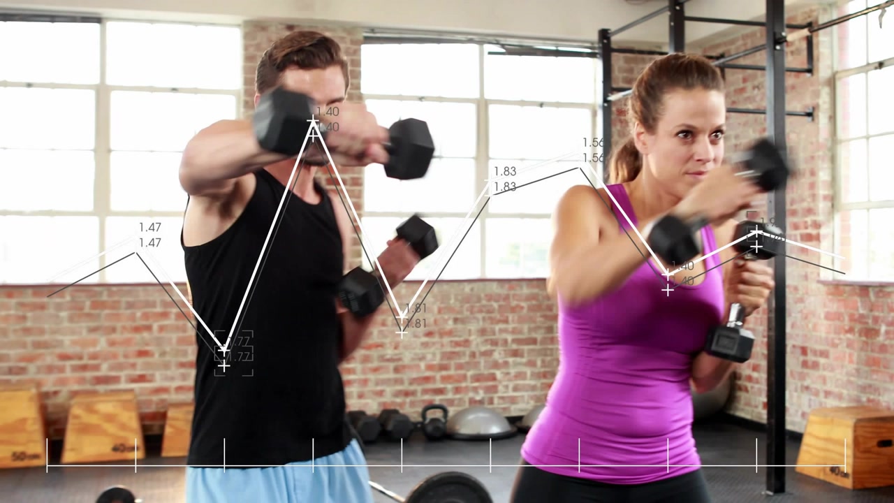 Man and Woman Punching with Dumbbells in a Gym with Data Overlay
