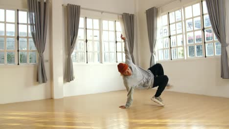 young athlete male break dancer, slow motion