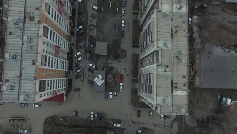 aerial view of apartment complex with parking