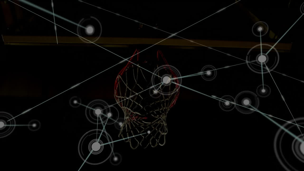 Digital network connections overlaying animation of basketball hoop in school gym