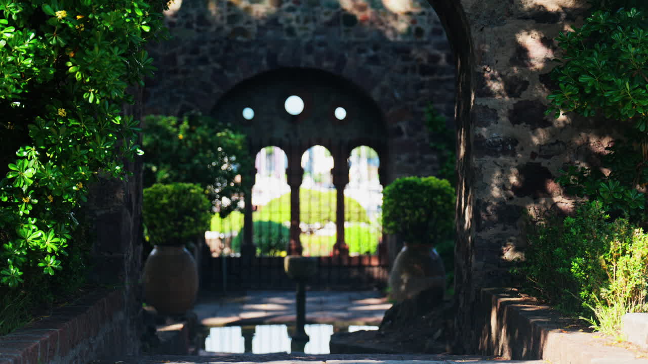 View of the gardens of the Chateau de la Napoule Castle in Mandelieu-La Napoule, France n daylight