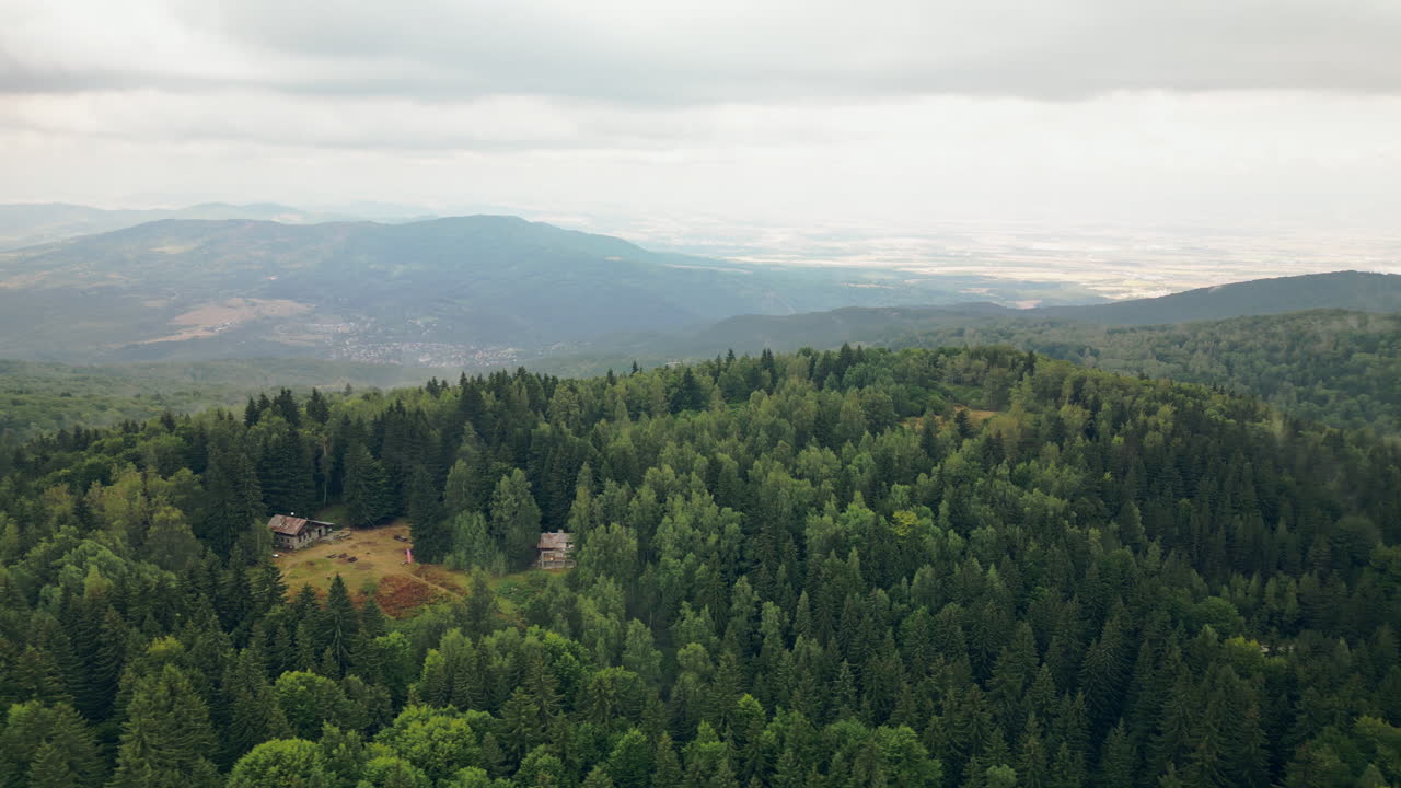 Lateral Aerial Reveals a Mountain Hut in the Natural Park of Vitosha with Dramatic Valley in the Background