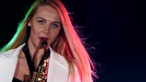 woman saxophonist on stage