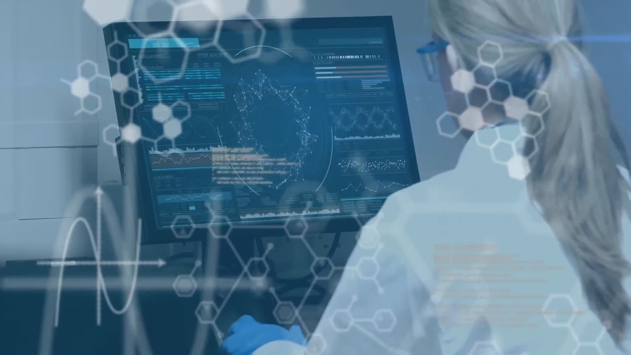 científicos con ropa de protección trabajando en un laboratorio con datos y diagramas