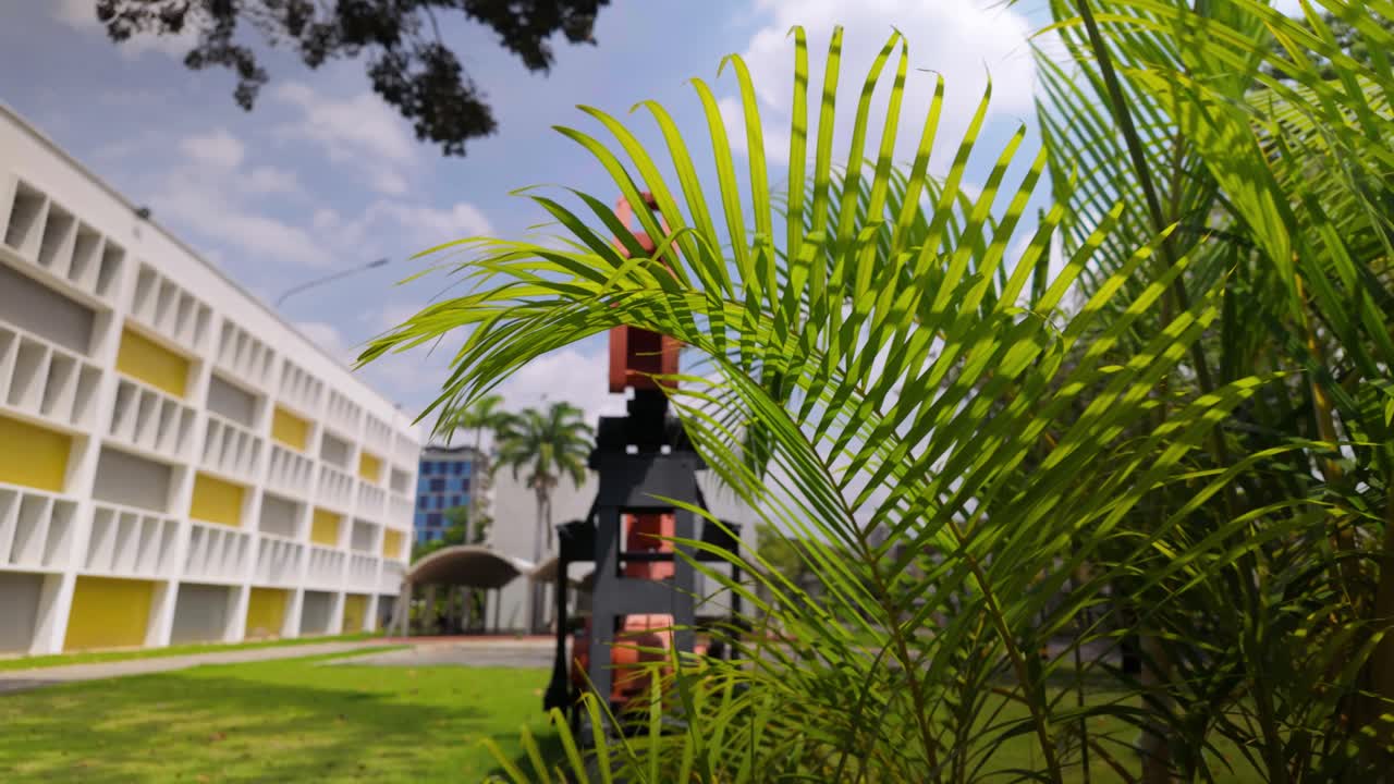Drill and plants in selective focus on sunny day, calm and industrial scene