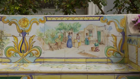 hand-painted tile bench depicting a mediterranean village scene