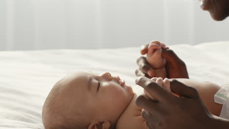 a father's tender interaction with his baby