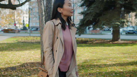 woman walking in an autumn park
