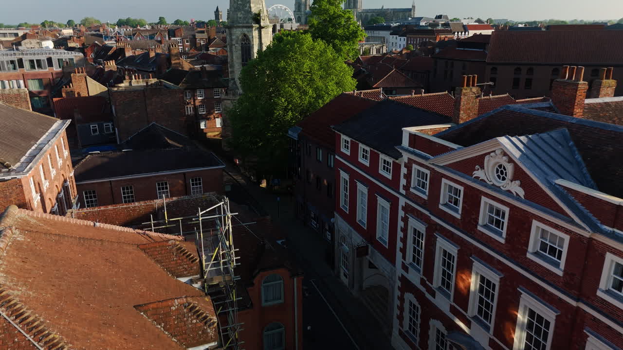 Slow Low Establishing Drone Shot Panning Up of York City Landscape and Skyline on Summer Morning UK