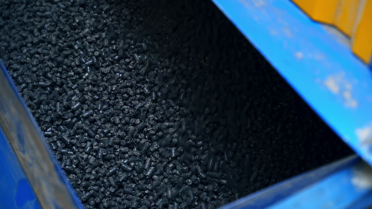 Compressed pellets for use as an eco-friendly renewable. Close up on a pile of compressed pellets for use as an eco-friendly renewable