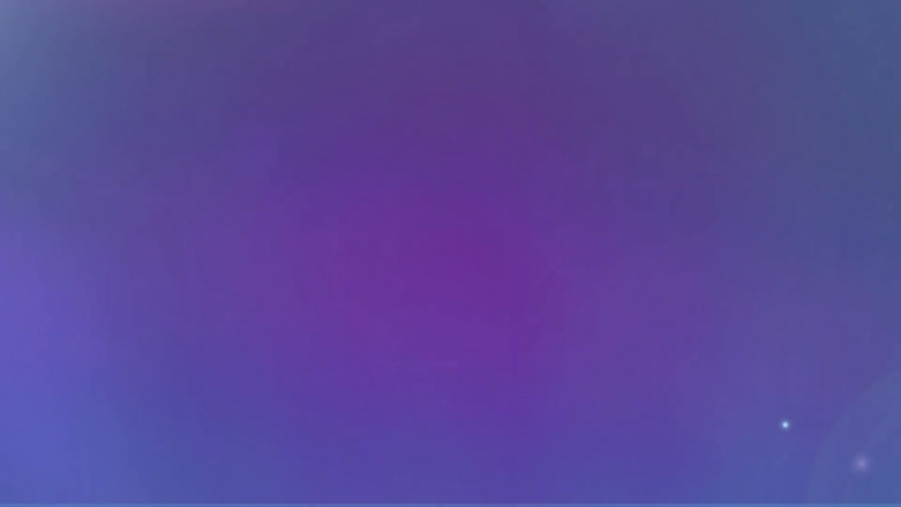 Animation of glowing spots of light moving on blue background