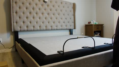 modern adjustable bed with tufted headboard